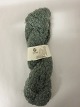 Mohair Bouclé
Mohair Bouclé is a natural product of a very high 
quality from the angora goat from South Africa.
The colour shown is: Olive, Colourno.: 1028
1 ball of wool containing 100 grams