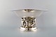 Jean Boggio for Roux-Marquiand, France. Large modernist compote in plated 
silver. Base with motive of dancing circus artists.