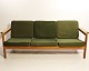 Sofa in oak and upholstered with green fabric, model J103 by Børge Mogensen for 
FDB from the 1960s.
5000m2 showroom.
