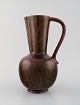 Richard Uhlemeyer, German ceramist.
Ceramic jug/vase, beautiful cracked glaze in red shades.
