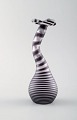 Ulrica Hydman Vallien for Kosta Boda, Sweden. Vase in clear mouth blown art 
glass decorated with black stripes.