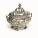 A small Rococo pewter tureen. Made in Germany. Dated 1777. H: 22,5cm. L: 26cm