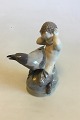 Royal Copenhagen Figurine of Faun with a Crow No 2113