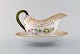 Royal Copenhagen Porcelain Flora Danica Sauce boat, hand-painted with flowers.