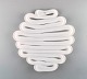 Anna Erhner for Kosta Boda. Large "Energy" dish in white art glass. 21st 
Century.