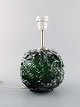 Kastrup / Holmegaard. Rare round table lamp in dark green and clear art glass. 
Modern design, 1960