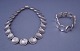 Bent Knudsen; jewellery set in sterling silver with strong rounded trinangulars