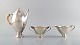 L'Art presents: 
Johan 
Rohde for Georg 
Jensen. Rare 
and early 
Coffee service 
in sterling 
silver. Dated 
1919.