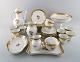 Royal Copenhagen. "Golden basket" Coffee service in porcelain. Complete for 9 
people.