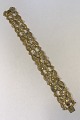 Danam Antik 
presents: 
Georg 
Jensen 18K Gold 
Diamondstudded 
Bracelet No 
17(1930-45)