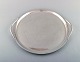 Harald Nielsen for Georg Jensen. Large art deco serving tray in hammered 
sterling silver. Model Number 847.