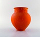 Svend Hammershøi for Kähler, Denmark. Vase in glazed stoneware. Beautiful orange 
uranium glaze. 1940