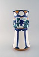 Alf Wallander for Rorstrand / Rörstrand. Large art nouveau vase in glazed 
faience with grapevine motif. Early 20th century.
