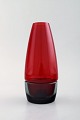 Per Lütken for Holmegaard. Rare "Hygge" lamp for candle lights in black and red 
art glass. Designed in 1958.