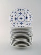 Royal Copenhagen. Set of 17 Blue Fluted Plain Plate # 1/181.
