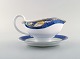 Royal Copenhagen. "Magnolia" sauce boat. Late 20th century.
