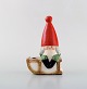 Lisa Larson for Gustavsberg. Candlestick. Elf on a sledge in glazed stoneware. 
Late 20th century.