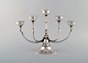 L'Art presents: 
Harald 
Nielsen for 
Georg Jensen. 
Art deco 
"Pyramid" 
candelabra in 
sterling 
silver. Dated 
...