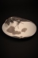 Rare Royal Copenhagen bowl with lizard and jeweler. 1905-07.
RC# 552/287.
13.5x10cm.