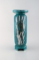 Wilhelm Kåge for Gustavsberg. Sjælden argenta art deco vase i glaseret keramik 
dekoreret med nøgen kvinde i sølvindlæg. Sverige 1940´erne.