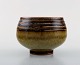 Rörstrand bowl in glazed stoneware. Beautiful glaze brown shades. 1960