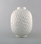 Gunnar Nylund for Rörstrand / Rorstrand. "Chamotte" vase in milky white glaze. 
1950