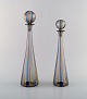 Gio Ponti for Murano / Venini. Two decanters in colorful mouth-blown art glass. 
1960