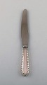 Georg Jensen "Rope" dinner knife in sterling silver and stainless steel. Dated 
1915-1930. Six pieces in stock.

