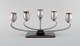 Cohr, Denmark. Five-armed candle holder in stainless steel. Mid 20th century.
