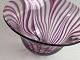 Art glass bowl 
in pink, purple 
and clear glass 
by Sigurd ...