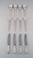 Georg Jensen "Continental" silver cutlery. Dinner service for four people in 
hammered sterling silver. Dated 1933-44.
