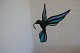 A decorative bird to hang up
Made by hand of coloured leaded glass
Bought about 1994 from the Danish glass artist, Ivan Boytler, well known for 
his glasswork/-art
In a very good condition