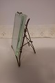 Photo frame, antique
This frame is made of thick glass with a stand made of brass which can be 
folded up
About the beginning of the 1900-years
About 12cm x 8,5cm/10cm
In a good condition
We have a large choice