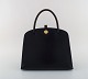 L'Art presents: Vintage Hermès handbag in black leather. 1960 / 70's.