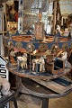 Decorative 1800s tivoli carousel in painted wood, metal and fabric with, among 
other things, fine carved white horses....
H: 66cm. Dia.:75cm.