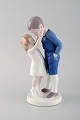 Michaela Ahlmann for Bing & Grondahl. Porcelain figure. Boy and girl. 1920