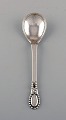 Evald Nielsen number 13 jam spoon in hammered silver (830). Dated 1924.
