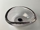 Art glass bowl by Vicke Lindstrand for the Swedish glassworks Kosta, 20th 
century, clear glass with purple threads