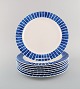 Jackie Lynd for Duka. Eight plates in glazed stoneware with blue striped 
decoration. Swedish design, early 21st century.
