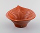 Jie, Sweden. Retro bowl in glazed ceramics. Beautiful glaze in dark orange 
tones. 1980s.
