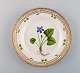 Royal Copenhagen Flora Danica salad plate in hand-painted porcelain with flowers 
and gold decoration. Model number 20/3573.
