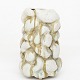 Roxy Klassik 
presents: 
Christina 
Muff / Eget 
værksted 
Organic 
stoneware vase 
with light and 
yellow-brown 
...