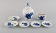 Royal Copenhagen Blue Flower Curved. Toothpick holder, tea caddy and five butter 
pads in porcelain with flower decoration.

