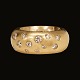 A 14kt gold ring with 12 diamonds of circa 0,65ct. Dauggard, Denmark, circa 
2005. Ringsize 53. W: 35,4gr