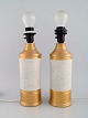 Bitossi for Bergboms, Sweden. Two table lamps in glazed stoneware. Beautiful 
glaze in sand and gold shades. 1960s.
