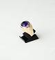 Ring decorated with amethyst and of 14 carat gold, stamped JØ.
5000m2 showroom.