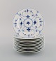 Twelve Royal Copenhagen Blue Fluted Plain plates. Model number 1/180. Dated 
1949.
