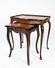 Nesting tables of dark wood with inlaid wood, in great antique condition from 
the 1960s. 
5000m2 showroom