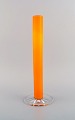 Anne Nilsson for Orrefors. Vase in clear and orange mouth-blown art glass. 
1980s.
