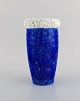 Gunnar Nylund for Rörstrand. Chamotte vase in glazed ceramics. Beautiful glaze 
in shades of blue. 1950s.
